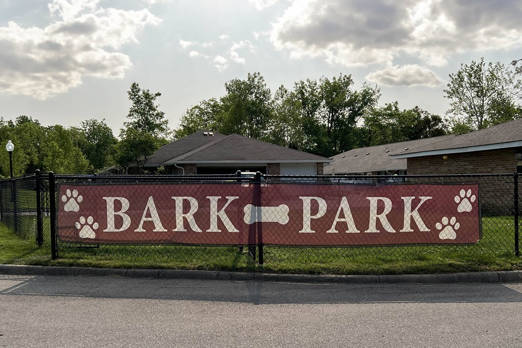 a sign that says bark park in front of houses  at Wyndemere Apartments, Franklin, 45005