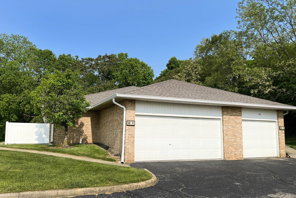 a home with a white garage door  at Wyndemere Apartments, Ohio, 45005