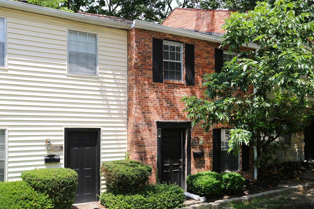 a brick and with black doors at Walnut Creek Townhomes, Ohio, 45236