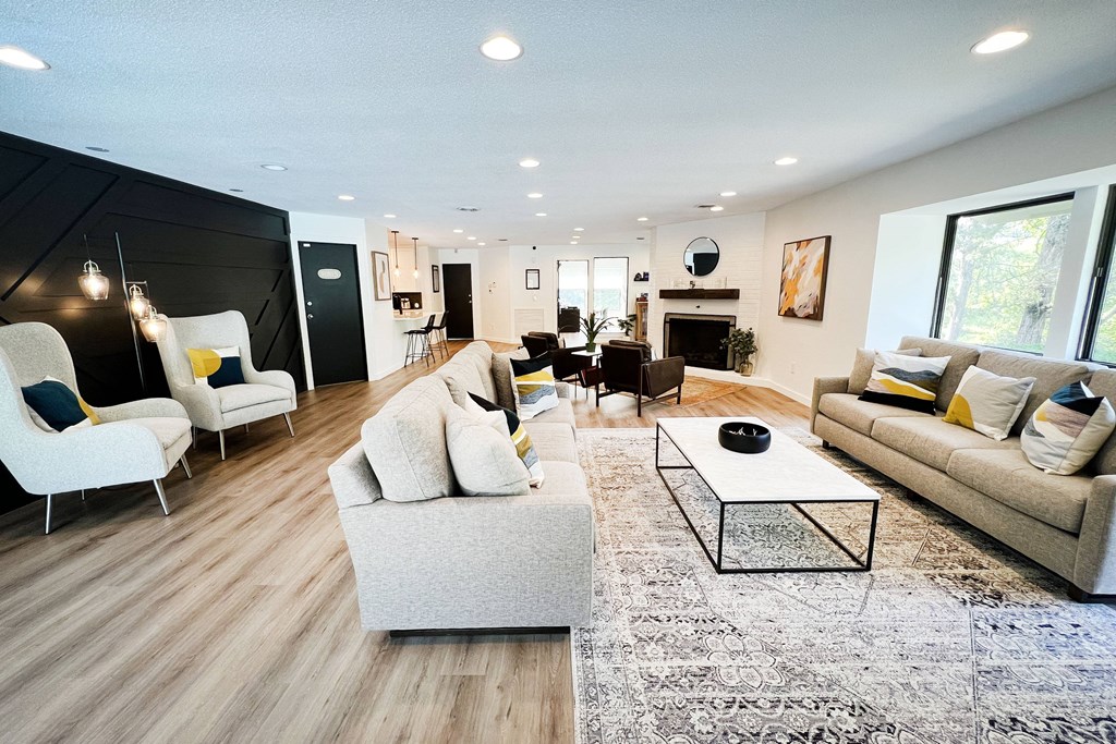 a living room with couches chairs and a coffee table at Indian Lookout Apartments, Cincinnati, 45238