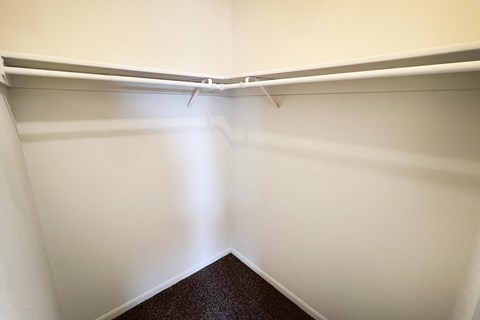 an empty closet in an empty room with white walls at Crown Crossing Apartments, Amelia, OH, 45102