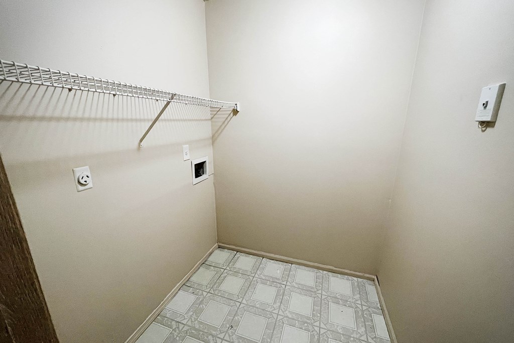 an empty room with a closet and a wire rack at Eagle Crest Apartments, Ohio