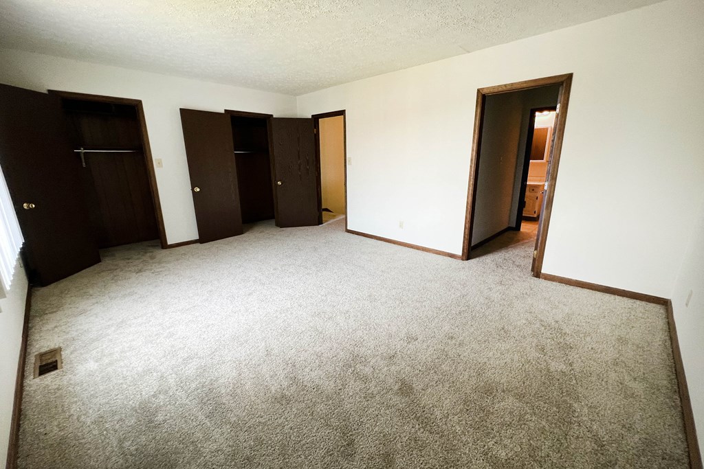 Bedroom With Closets  at Crestbrook Apartments & Townhomes, Crescent Spring, KY