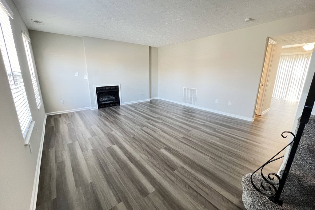 Wood Floor Living Room  at Revere Village Apartments, Centerville, Ohio