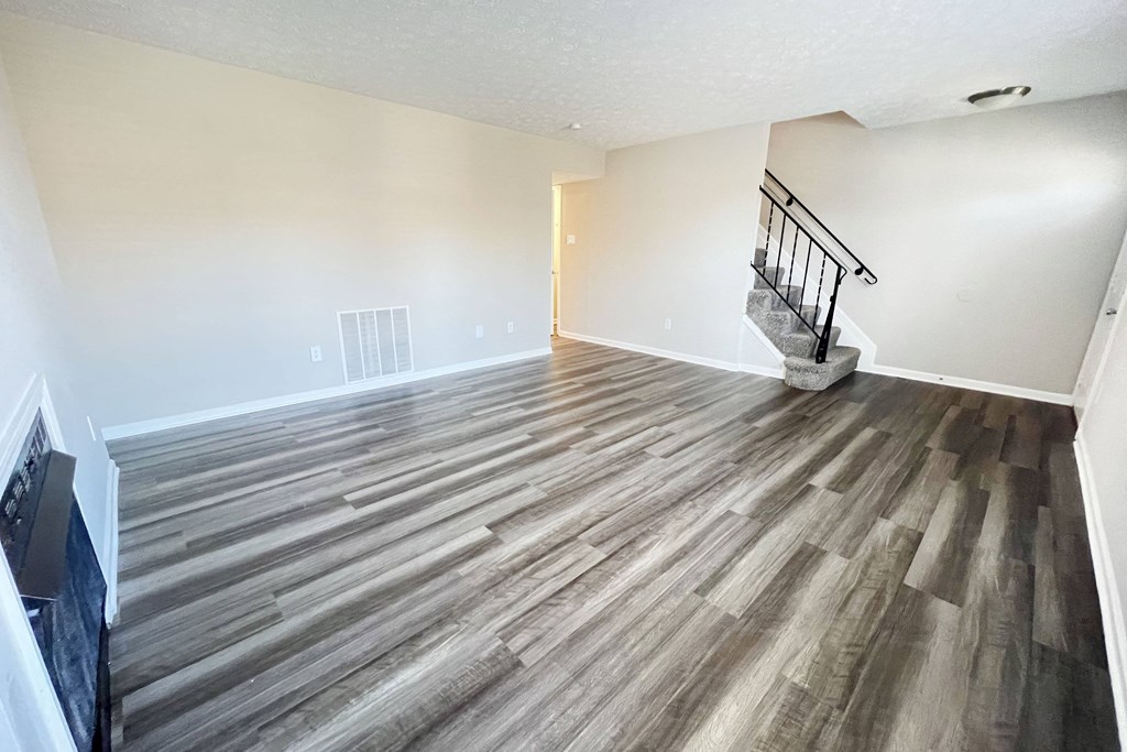 Contemporary Finishes Include Wood And Tile Flooring  at Revere Village Apartments, Ohio