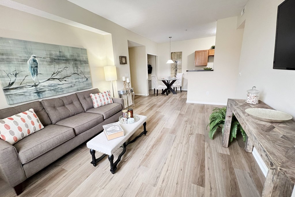 a living room with a couch and a table at Residences at Northgate Crossing, Ohio, 43235
