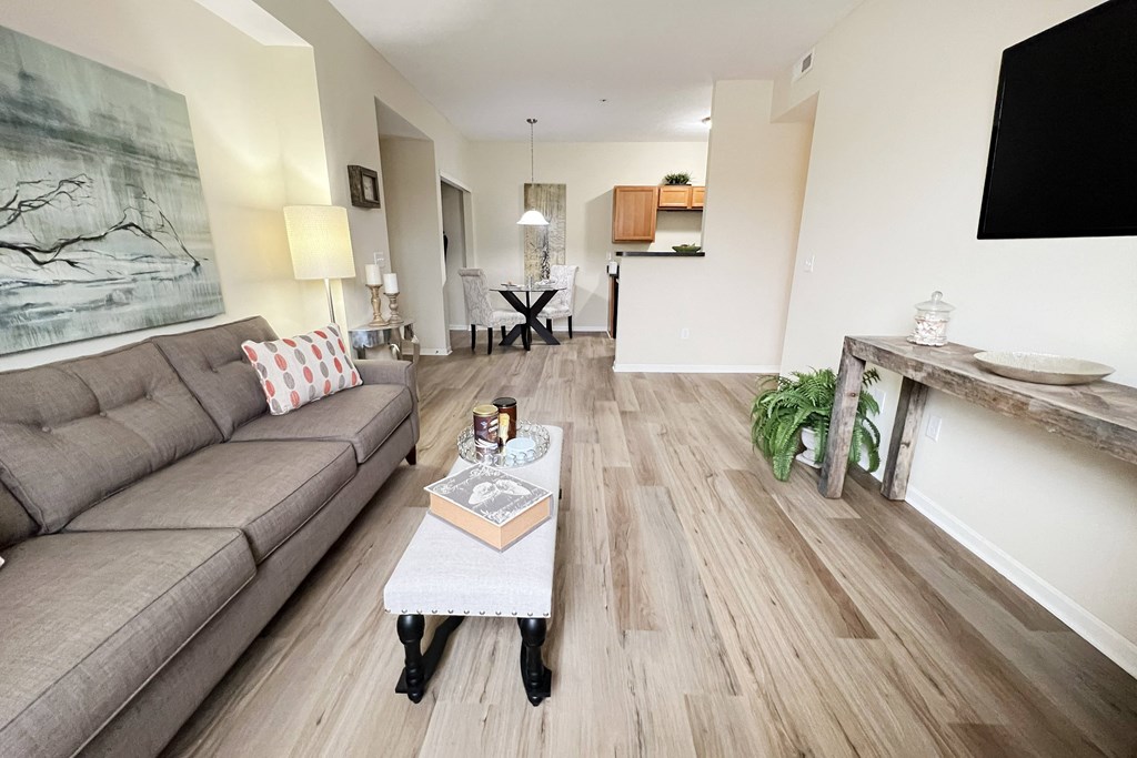 a living room with a couch and a coffee table at Residences at Northgate Crossing, Ohio, 43235