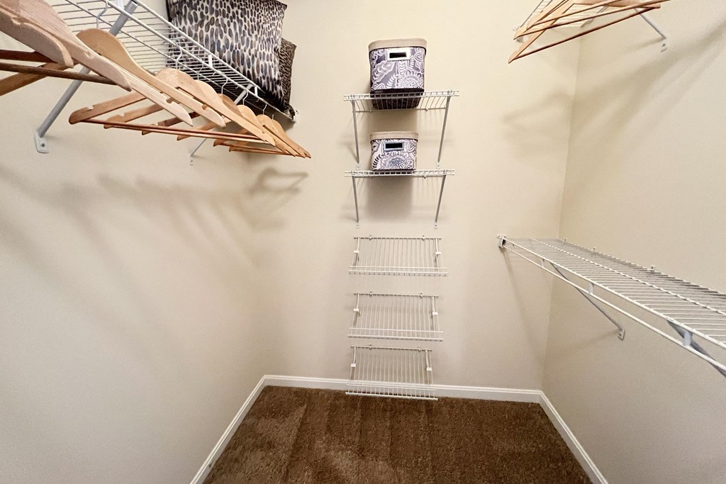 spacious closet with shelves and hooks at the falls apartments at Residences at Northgate Crossing, Ohio, 43235