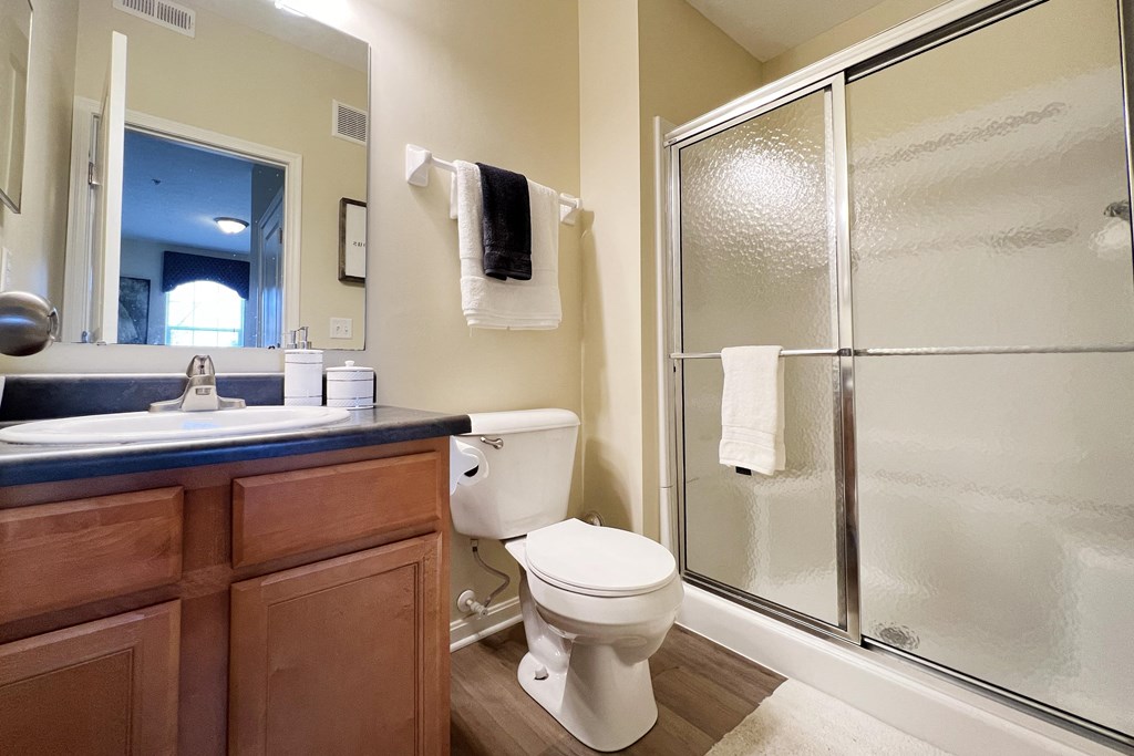 a bathroom with a shower toilet and sink at Residences at Northgate Crossing, Ohio, 43235