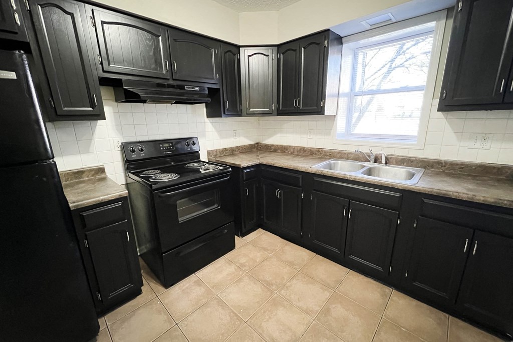 Kitchen with black appliances at Park Place, Kentucky, 40475