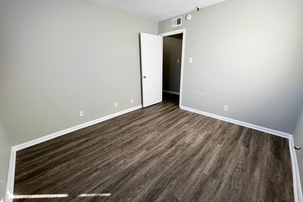Bedroom with wooden floor at Park Place, Richmond, KY