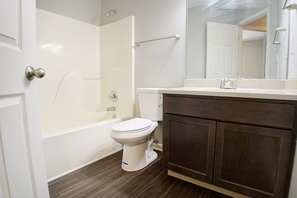 a bathroom with a toilet and a sink  at Aberdine Place, Georgetown, Kentucky