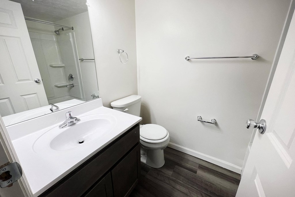 Bathroom with sink and cabinets at Deercross Apartments, Cincinnati