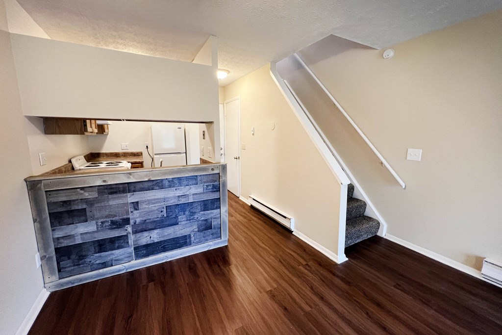 a photo of the kitchen and living room of a 560 square foot, 1 bedroom apartment at  at Concord Woods Apartments, Milford, OH, 45150