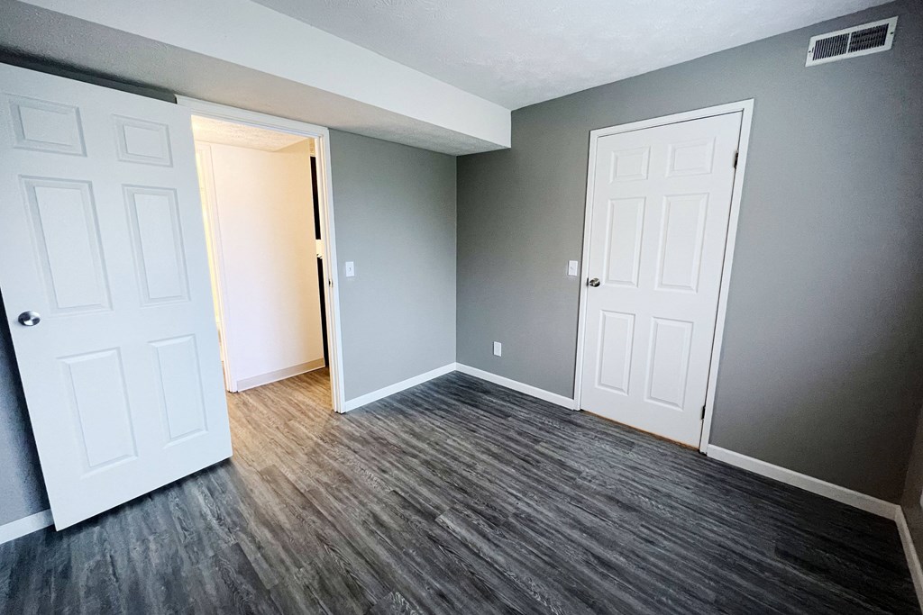 an empty room with two doors at Quail Meadow Apartments, Ohio, 45240