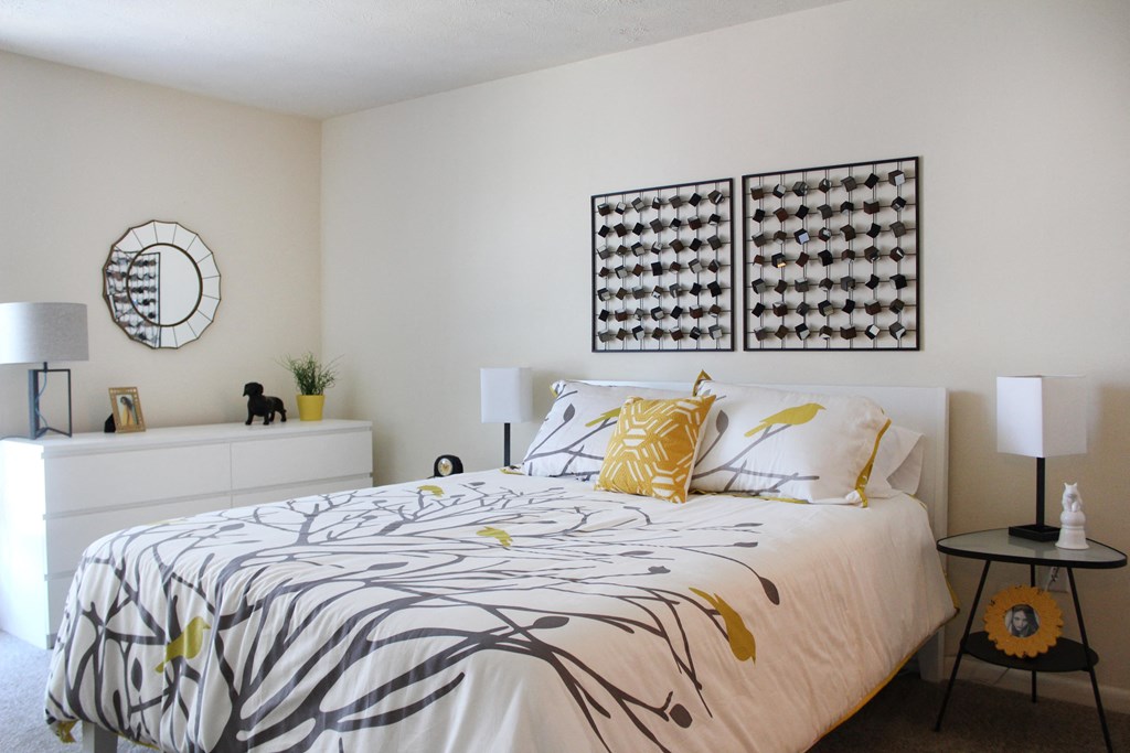 Bedroom with cozy bed at Miamisburg by the Mall, Ohio