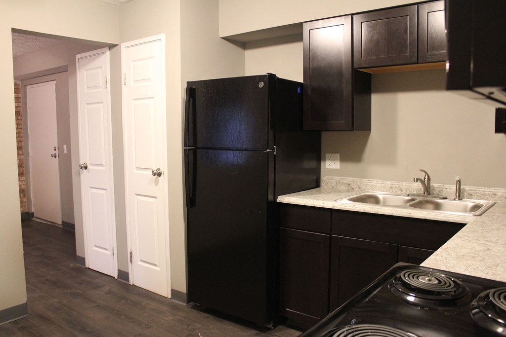 Kitchen with fridge at Quail Meadow Apartments, Ohio