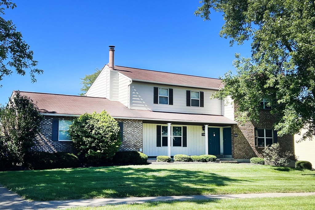 a house with a lawn in front of it  at The Villas at Kingswood, West Chester, Ohio