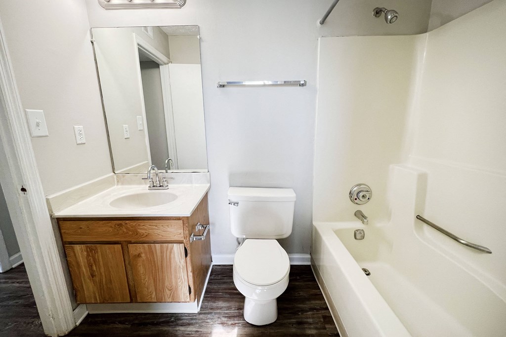 an empty bathroom with a sink toilet and bathtub at 450 on Keeneland, Richmond, KY