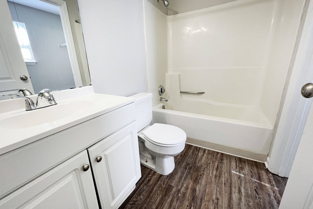 a bathroom with a toilet sink and bathtub at 450 on Keeneland, Richmond, 40475