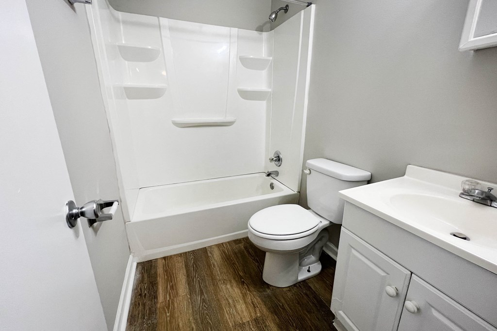 an empty bathroom with a toilet and a shower at Park Place, Richmond, KY, 40475