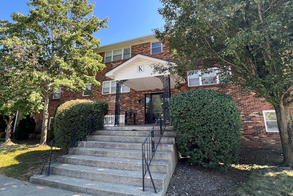 a brick house with stairs in front of it at Park Place, Kentucky, 40475