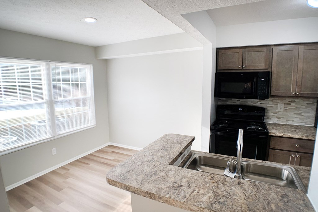 Stainless Steel Sink With Faucet In Kitchen  at Steeplechase Apartments, Loveland, 45140
