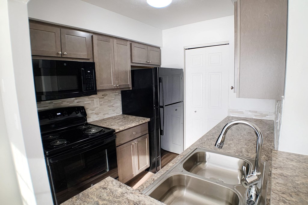 Kitchen Sink With Faucet at Steeplechase Apartments, Ohio