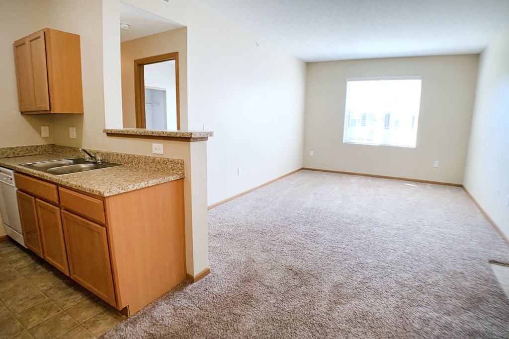 Living room and kitchen at Brookfield Village Apartments, Ohio