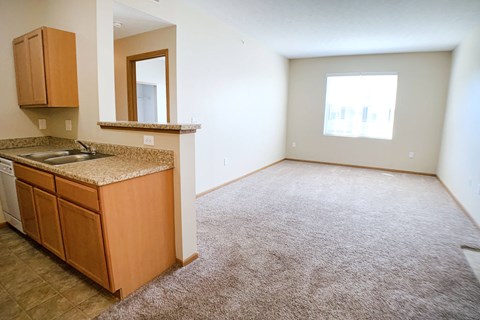 Living room and kitchen at Brookfield Village Apartments, Ohio