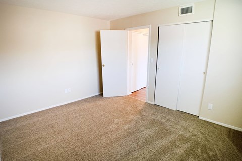 Carpeted Bedroom  at Crown Crossing Apartments, Amelia, OH, 45102