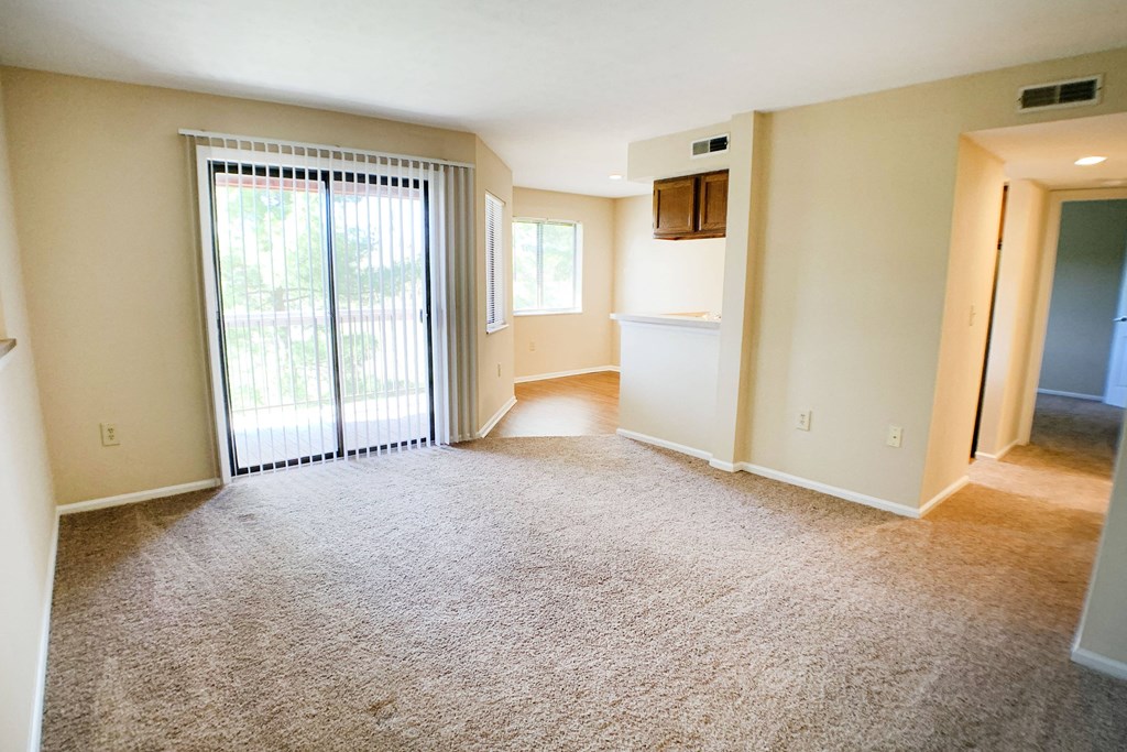 Living room with balcony at Deercross Apartments, Ohio, 45236