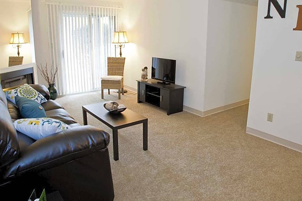 a living room filled with furniture and a flat screen tv at 450 on Keeneland, Richmond, KY 40475