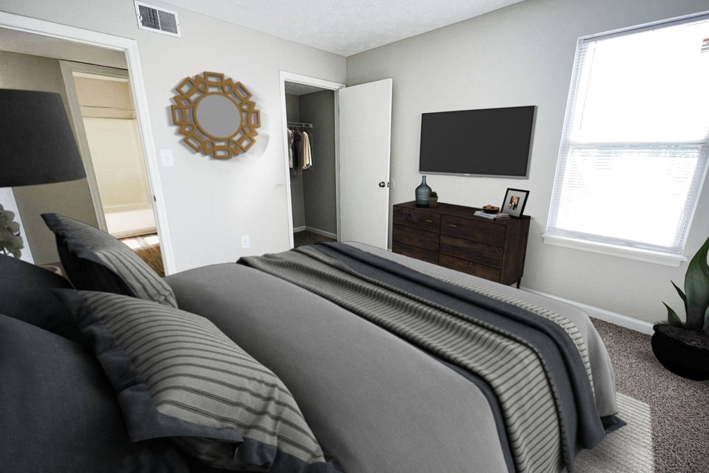 a bedroom with a bed and a dresser at 450 on Keeneland, Richmond