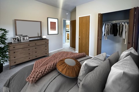A bedroom with a bed, dresser, and a mirror.