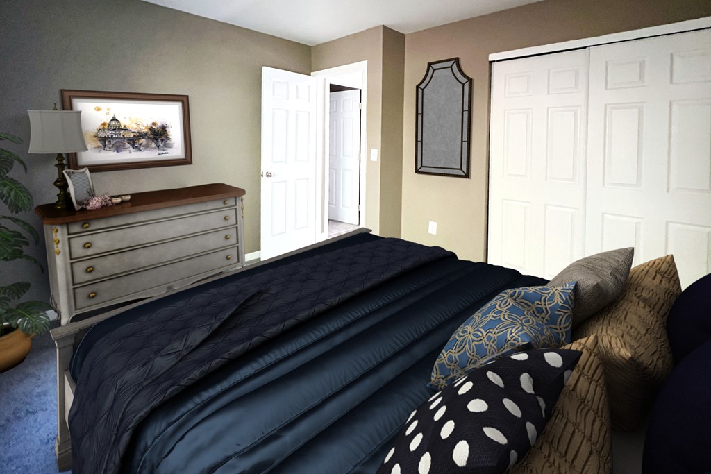 A bedroom with a bed, dresser, and mirror.