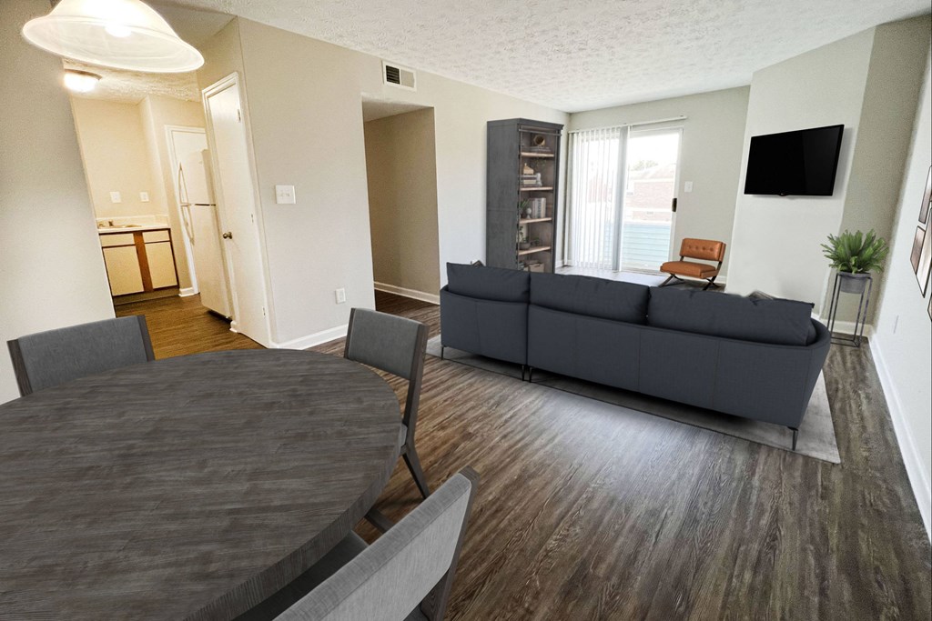 a living room and dining room with a couch at 450 on Keeneland Apartments, Richmond