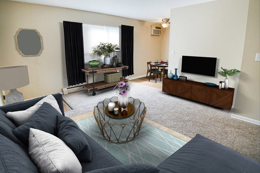Living room area with tv at Sharondale Woods Apartments, Cincinnati, OH