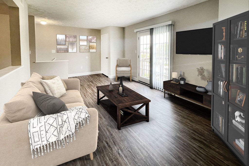 a living room with a couch and a table at 450 on Keeneland Apartments, Richmond, KY 40475