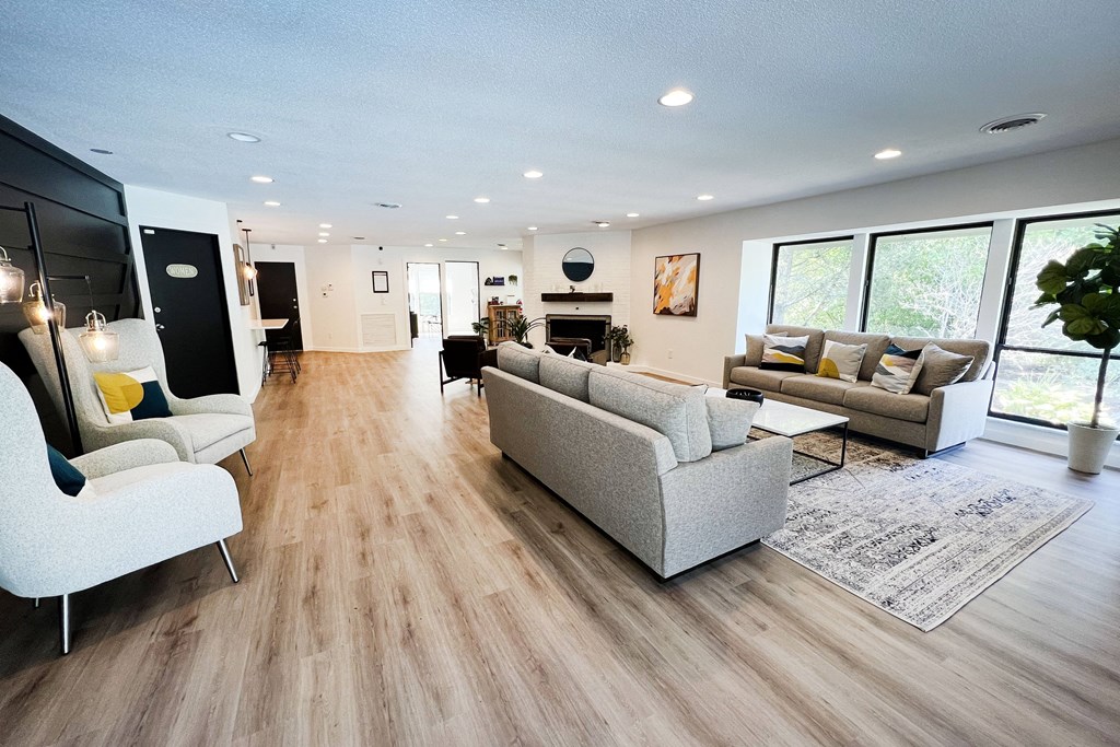 a living room with hardwood floors and white walls at Indian Lookout Apartments, Cincinnati, Ohio