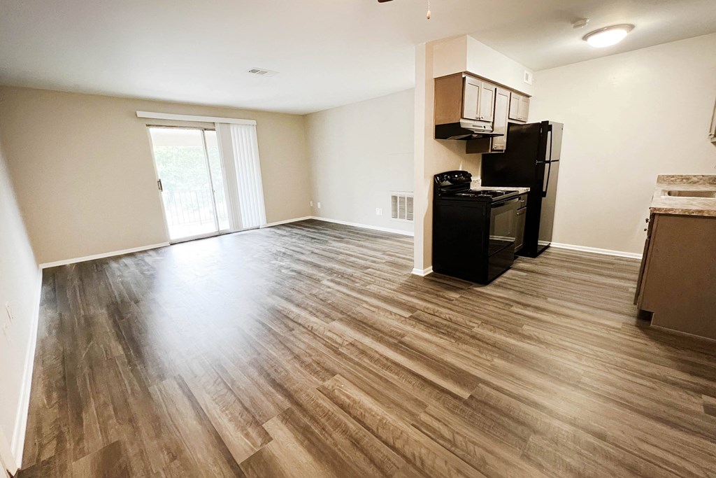 a kitchen and living room with hardwood floors at Crown Ridge Apartments, Franklin, 45005