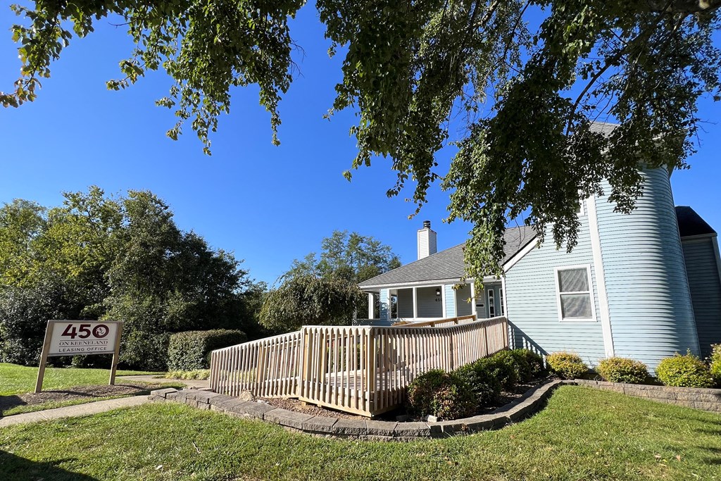 a house with a fence in front of it at 450 on Keeneland, Richmond Kentucky