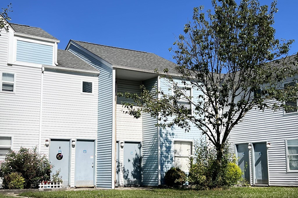 a gray house with a gray roof and a gray tree in front of it at 450 on Keeneland, Richmond, KY 40475