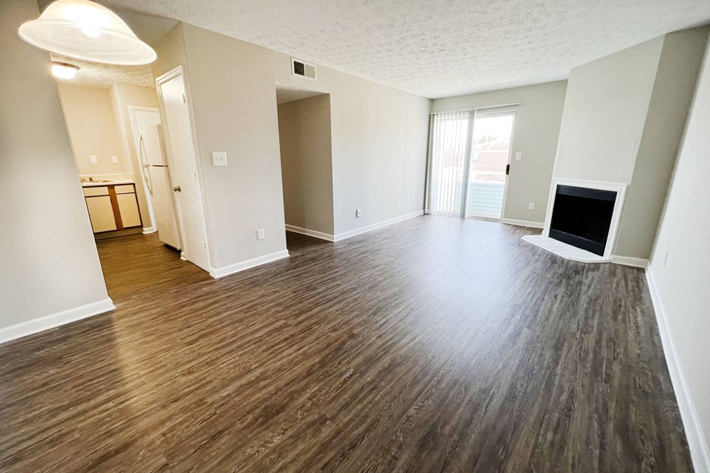 an open living room with a fireplace at 450 on Keeneland, Richmond Kentucky