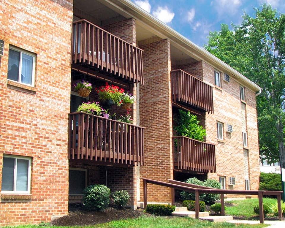 a brick apartment building with balconies at Hunter Ridge Apartments, Cincinnati, Ohio