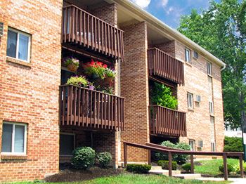 a brick apartment building with balconies at Hunter Ridge Apartments, Cincinnati, OH