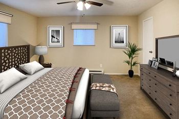 a bedroom with a bed and a dresser at Hunter Ridge Apartments, Cincinnati, 45244
