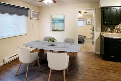 a dining room with a table and chairs at Hunter Ridge Apartments, Cincinnati, OH, 45244