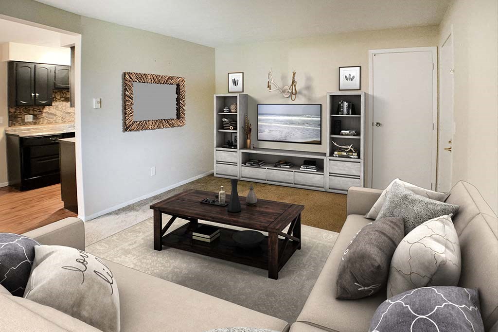 a living room with a couch a table and a television at Hunter Ridge Apartments, Cincinnati, Ohio