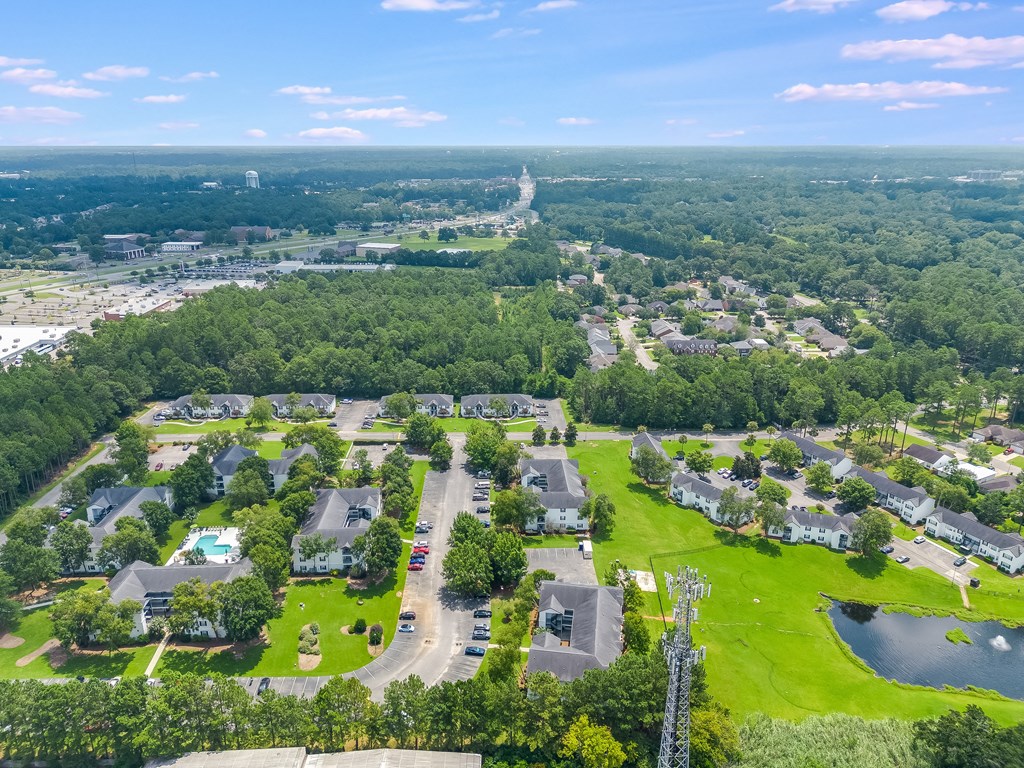 an aerial view of a neighborhood with green grass and trees at Dothan Farms, Dothan, AL